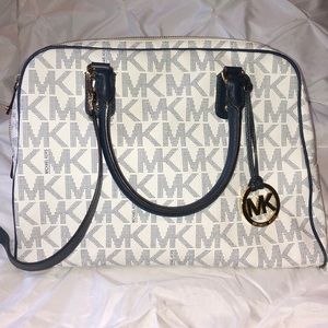 MK navy and white bag